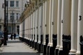 Symmetrical view of a street in London showing house number