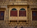 Symmetrical windows in India. Colorful windows background.