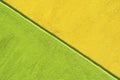 Symmetrically separated yellow and green wall background texture