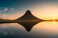Symmetry Kirkjufell mountain with lake reflection during sunrise at Iceland Royalty Free Stock Photo