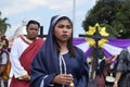 Sympathetic woman felt disgust on Jesus Christ trial walking, street drama, community celebrates Good Friday representing the eve