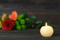 Sympathy card with memorial candle and flowers