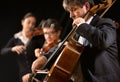 Symphony orchestra performance: celloist close-up Royalty Free Stock Photo