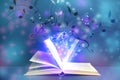 Symphony shining with musical notes from open book on background Royalty Free Stock Photo