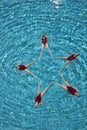 Synchronised Swimmers Forming A Star Shape Royalty Free Stock Photo