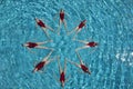 Synchronised Swimmers Forming A Star Shape Royalty Free Stock Photo