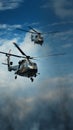 Synchronized flight two choppers command the vibrant blue airways Royalty Free Stock Photo