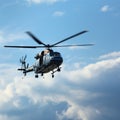 Synchronized flight two choppers command the vibrant blue airways Royalty Free Stock Photo