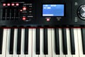 The synthesizer is in the recording Studio. Included electronic piano with burning scoreboard. Large white and black keys