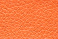 Synthetic leather orange background texture