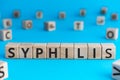 Syphilis - word from wooden blocks with letters