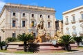 Syracuse, Sicily, Italy - Apr 10th 2019: Beautiful Fountain of Diana on the Archimedes Square in famous Ortigia Island