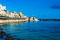Syracuse, Sicily, Italy Ã¢â¬â August 23, 2018 : Panoramic view of the Ortigia waterfront in Syracuse with the blue sky background Royalty Free Stock Photo