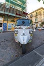 A traditional three wheel taxi on the streets of Siracusa, Italy