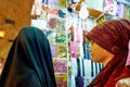 Syria. Aleppo. A veiled woman in the souq