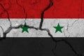 Syria flag on the cracked earth