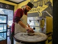 A Syrian Man Making Kunafeh in a Restaurant in Nepal Royalty Free Stock Photo