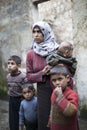 Syrian mother with her childern in Aleppo.