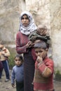 Syrian mother with her childern in Aleppo.