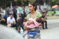 Syrian refugee woman with child in Belgrade