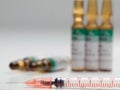 Syringe and ampulas Royalty Free Stock Photo