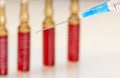 Syringe and ampulas Royalty Free Stock Photo