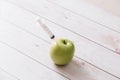 Syringe apple isolated on white background Royalty Free Stock Photo