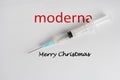 Syringe as a Christmas gift from moderna