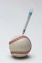 Syringe in baseball, vertical Royalty Free Stock Photo