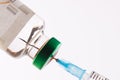 Syringe filling from vial of clear liquid such as insulin, on white background with copy space Royalty Free Stock Photo