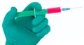 Syringe in hand medical glove medicine Royalty Free Stock Photo