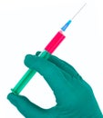 Syringe in hand medical glove medicine Royalty Free Stock Photo