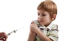 Syringe injecting child Royalty Free Stock Photo