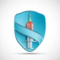 Syringe with injection on the background of a shield Royalty Free Stock Photo