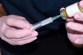 Syringe for injection in hands of beautician