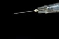 Syringe, injection needle on black background Royalty Free Stock Photo