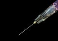 Syringe, injection needle on black background Royalty Free Stock Photo