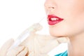 Syringe and lips Royalty Free Stock Photo