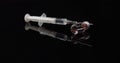 Syringe and Medicine on Black Background Isolated Royalty Free Stock Photo