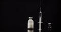 Syringe and Medicine on Black Background Isolated Royalty Free Stock Photo