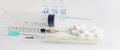 Syringe and medicines on a white background, panoramic photo Royalty Free Stock Photo