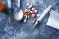 syringe , pills and capsules on table Royalty Free Stock Photo