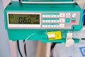 Syringe pump, dropper for epidural anesthesia and drug administration during operations and medical procedures in the hospital Royalty Free Stock Photo