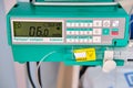 Syringe pump, dropper for epidural anesthesia and drug administration during operations and medical procedures in the hospital - Royalty Free Stock Photo