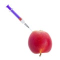 Syringe in red apple Royalty Free Stock Photo