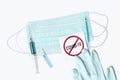 Syringe, stethoscope, glove, and medical mask with prevention coronavirus sign
