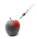 Syringe stuck in an apple