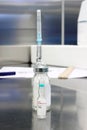 Syringe, vial, ampoule one after another