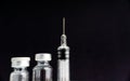 Syringe and vials closeup with selective focus and crop fragment