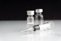 Syringe and vials closeup with selective focus and crop fragment